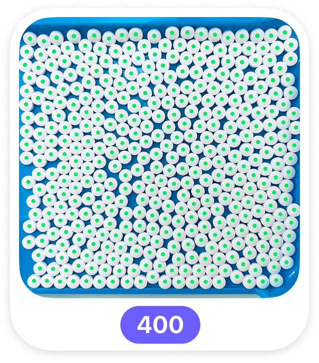 A tray containing 400 pills counted by Pill Counter.